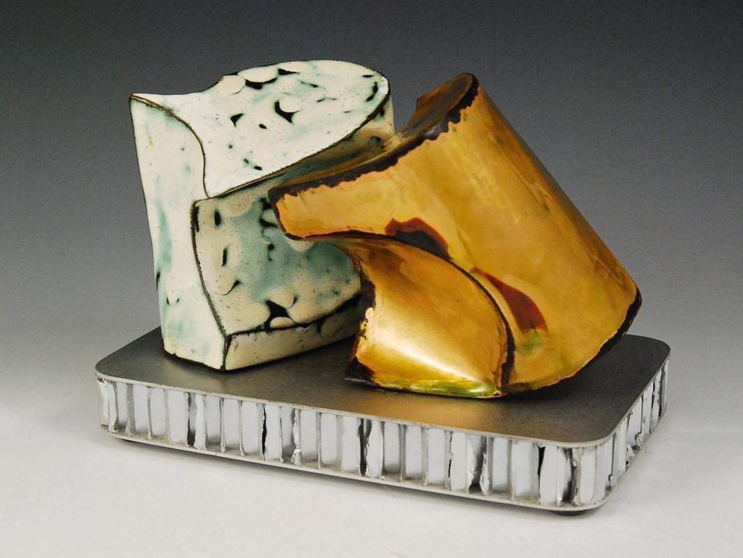 Ken Roussin, Winnetka, CA, U.S. “Inseparable #3” (15.2 x 9.5 x 12.7 cm) (6 x 3.75 x 5 in) Copper, aluminum, vitreous enamel, www.foldforming.org