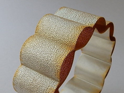 Christina Brandewie, Cincinnati, OH, U.S., “Honeycomb Bracelet” (7.6 cm x 2.5 cm) ​(3 in x 1 in) ​Sterling silver, 18K yellow gold plated -- www.foldforming.org
