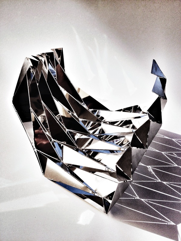 Angela Fung, Hassocks, U.K. “Origami Sculpture” (50 cm x 30 cm x 30 cm) laser cut stainless steel -- www.foldforming.org