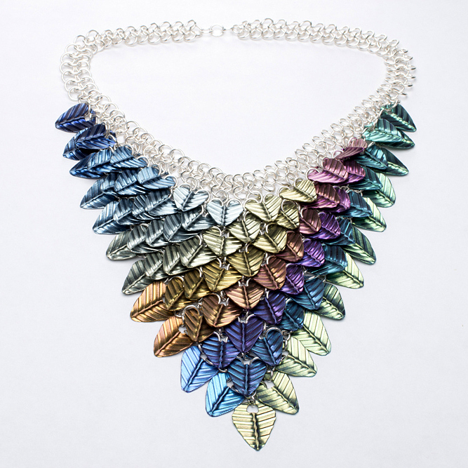 Chelsea Dyck, Calgary, Alberta, CA “Colours of the Seasons Collar” (7 in x 7 in) (17.8 cm x 17.8 cm) niobium, sterling silver -- www.foldforming.org