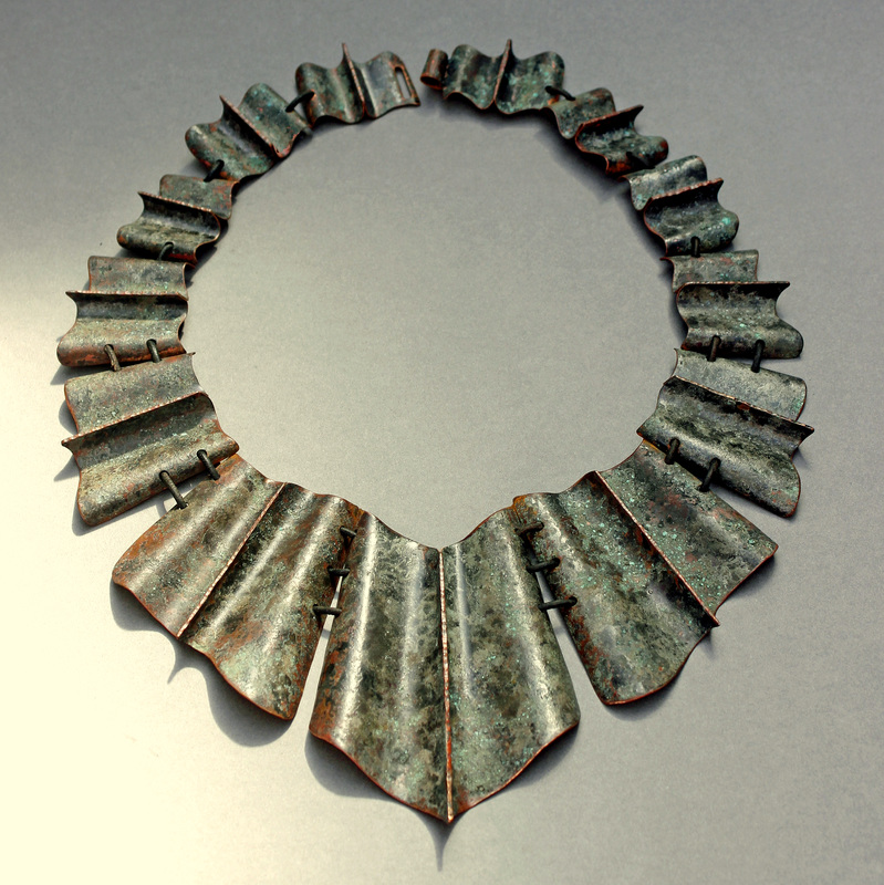 Sher Novak, Albany, CA, U.S., “Fluted Collar” (31.8 x 23.5 cm) Copper, leather cord, patina -- www.foldforming.org