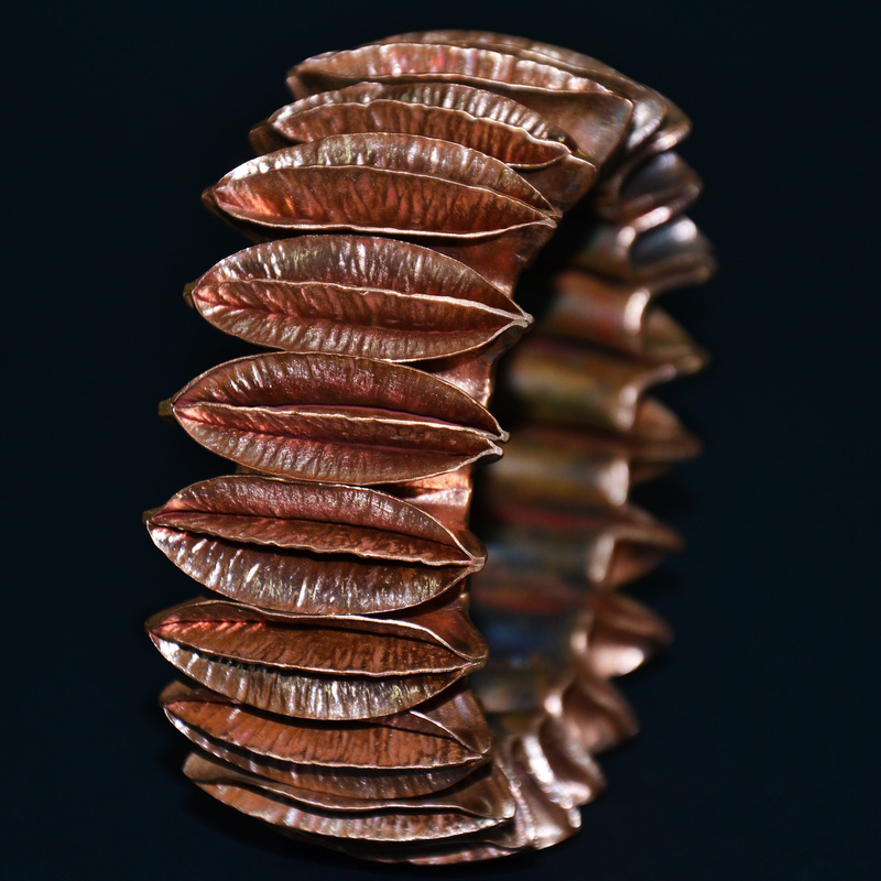 Hendrik Schouten, Santa Cruz, Aruba, “Cross Foldformed Bracelet” ​(9.5 x 4.2 cm) copper pipe, photo by Chris Schouten -- www.foldforming.org