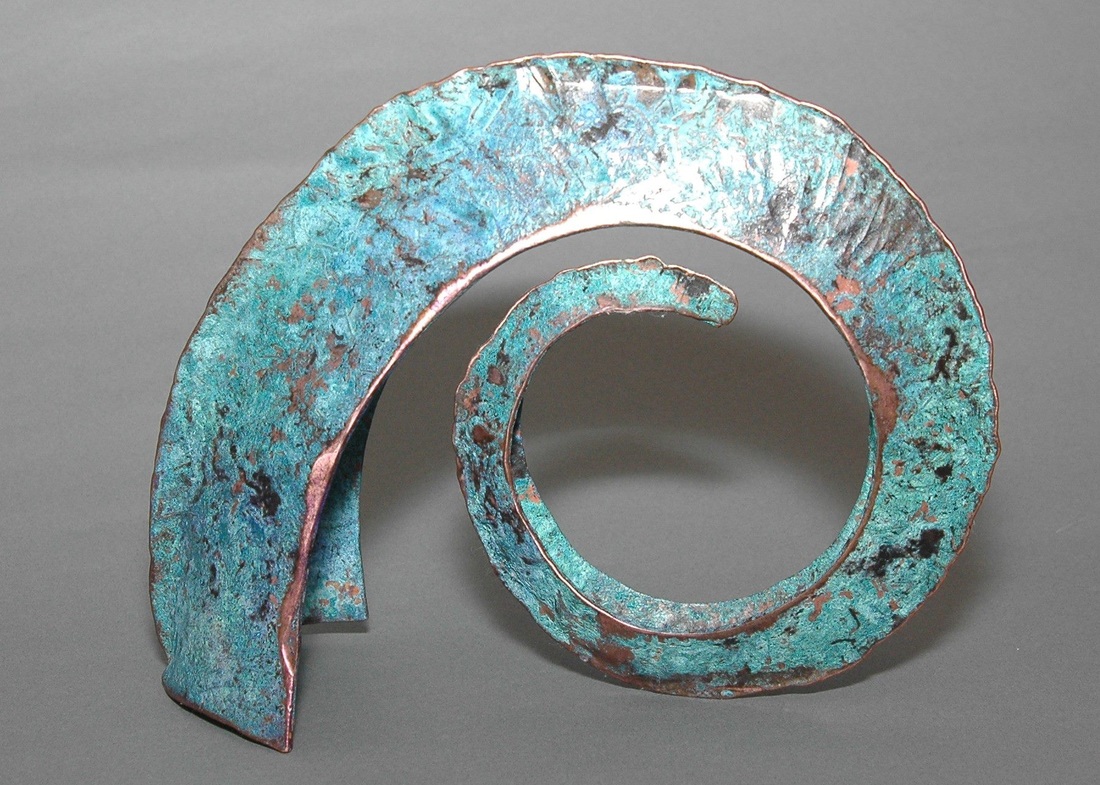This copper and patina Rueger fold by Pat Downing is about 12 in high; made from heavy 1/8” copper, forged hot -- www.foldforming.org
