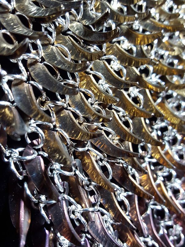 Detail view: Chelsea Dyck, Calgary, Alberta, Canada “Impregnable” (22.8 x 35.6 cm) (9 x 14 in) Niobium, sterling silver, www.foldforming.org
