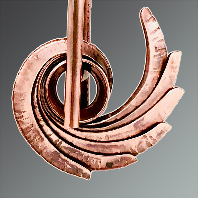 THIRD PLACE 2022: Thomas Filippini, Richmond, VA, U.S. “Balance Knot” (5 x 5 cm) (2 x 2 in) Copper, photos by Silvio Dominic, www.foldforming.org