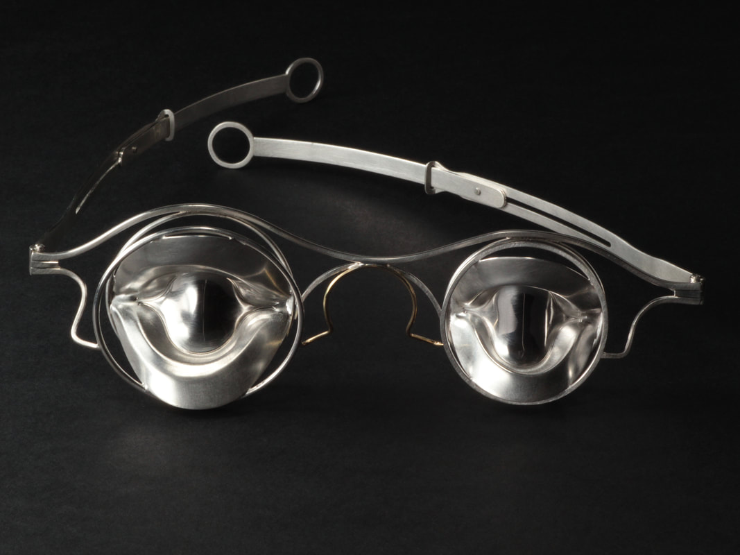 Paul Wells, London, England, U.K. “Android Spectacles” (13 x 4 x 15 cm). Sterling silver, 18k yellow gold; photo by Anastasia Young - www.foldforming.org