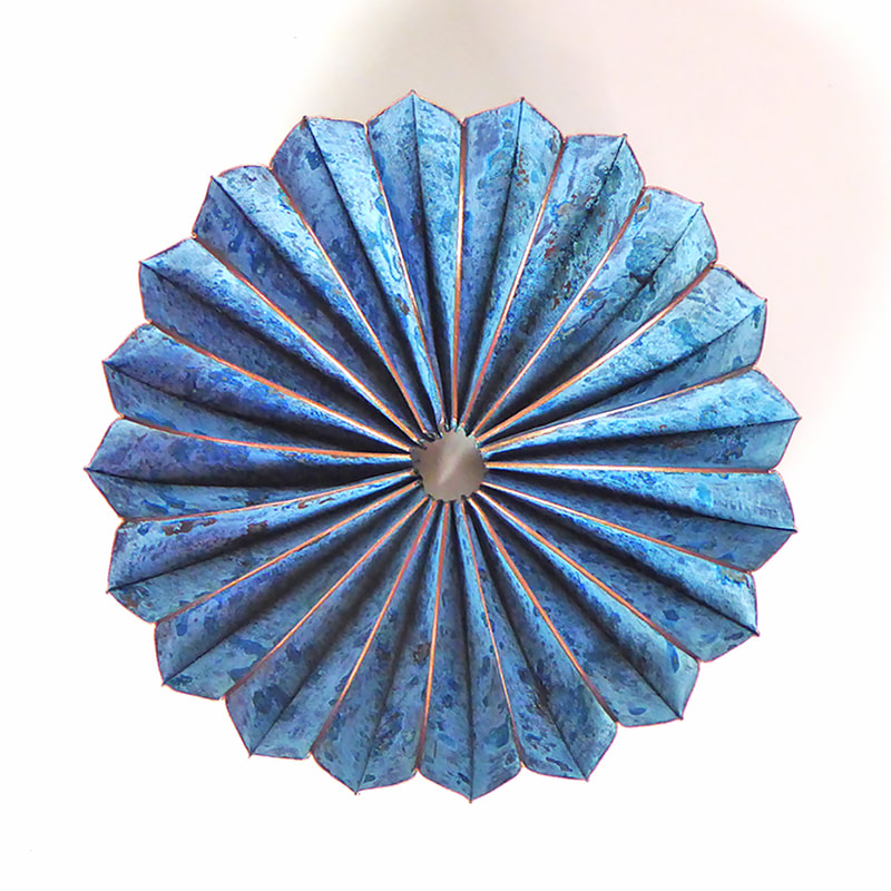 SECOND PLACE: Emma-Jane Rule, Leicester, England, U.K. “Blue Pod Dish” (15 x 15 x 5 cm) Copper, ammonia, salt, www.foldforming.org